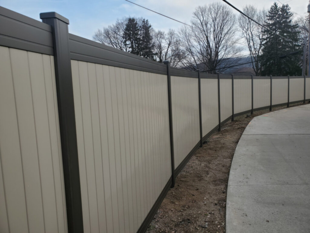 Black Posts and Rail with Tan Fence Boards in Spokane.